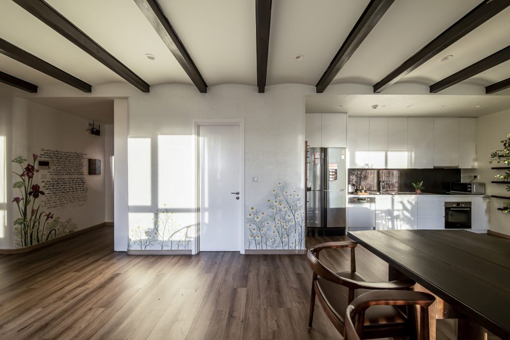 Minimalist kitchen in Diamond Island Apartment with natural materials.